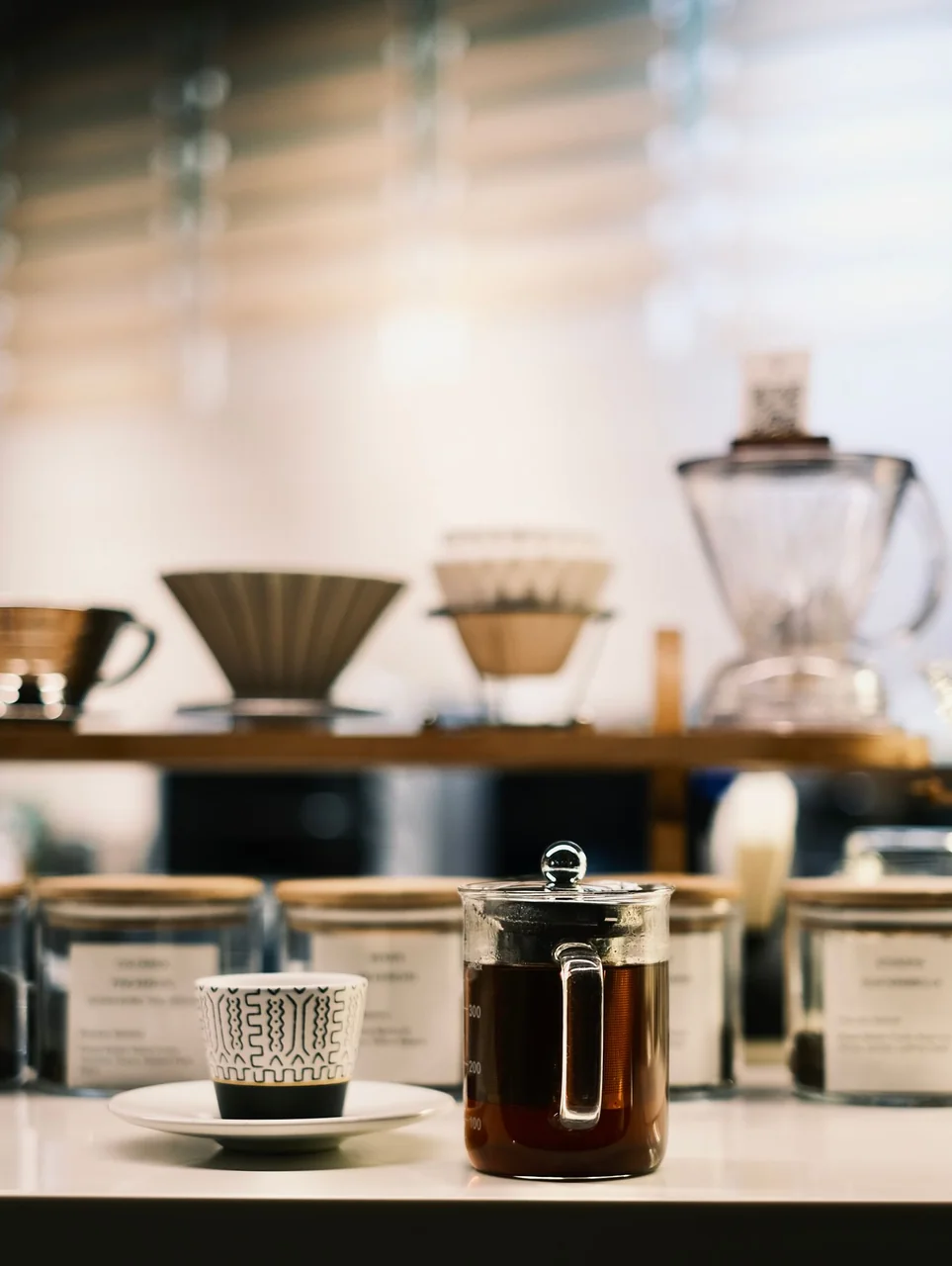Artisan filter coffee and botanicals served in elegant ceramic ware