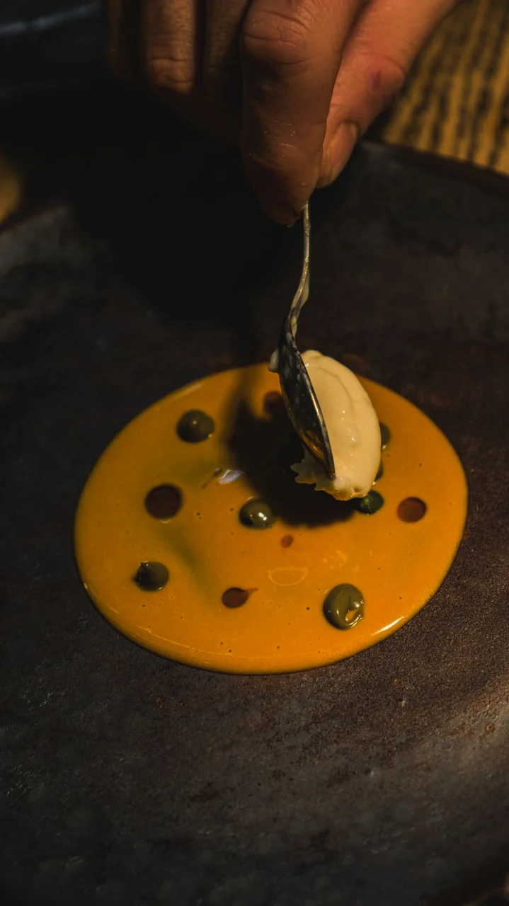 Artful presentation of gourmet dessert with delicate textures for private dining courses