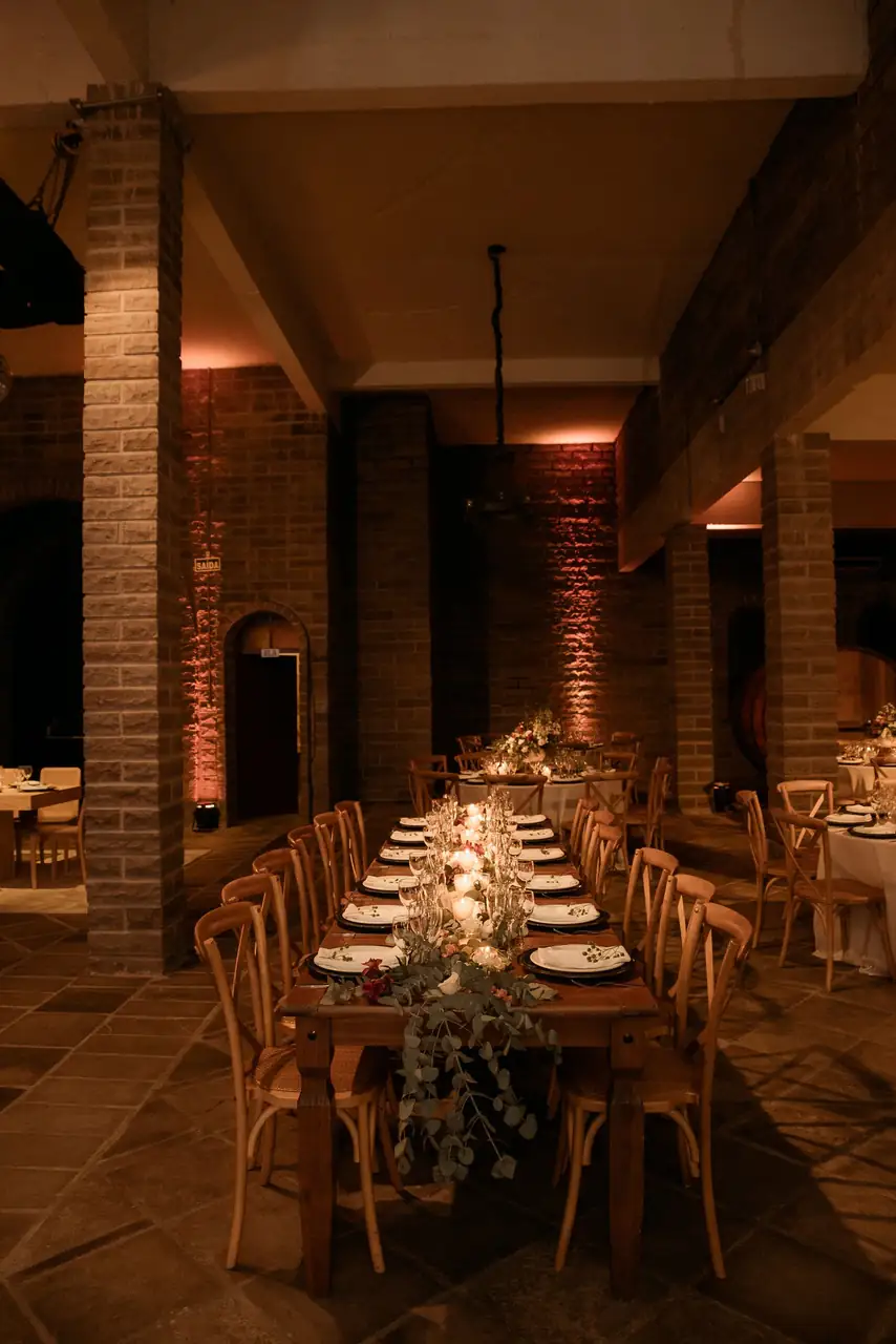 Warm ambient interior of dining salon set with immaculate glassware and linens