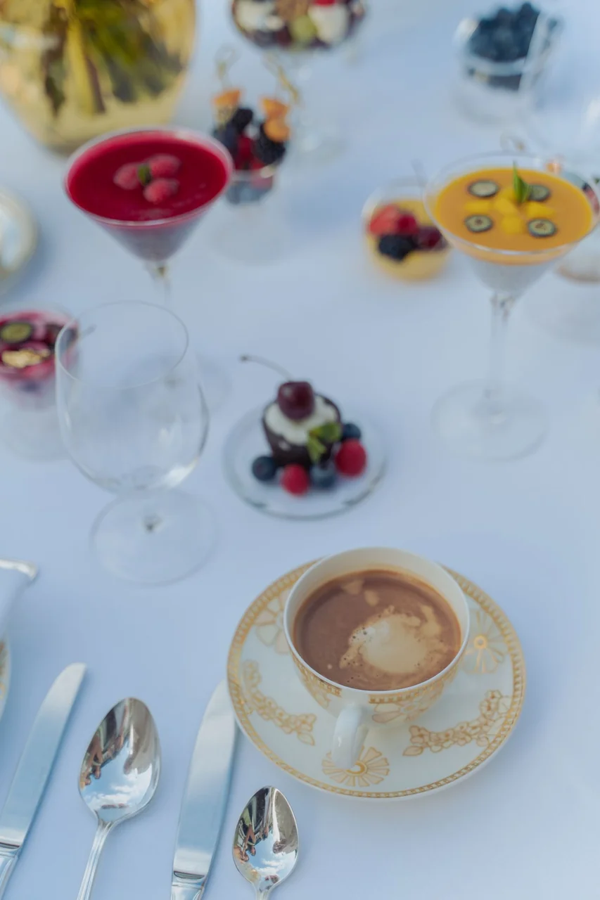 Delicate seasonal fruit tart with fresh blackberries and brewed tea